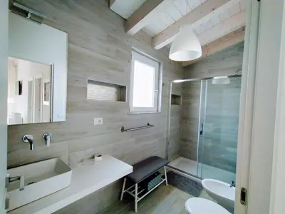 Bagno di IKEBANA VILLAS PORTO PINO BEACH