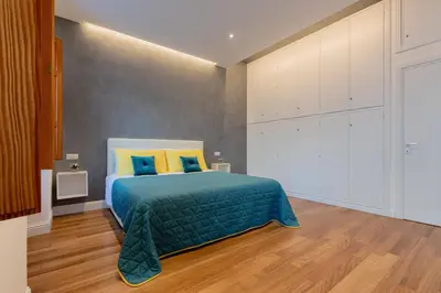Letto o letti in una camera di Marcus Suite