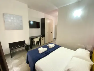 Letto o letti in una camera di NEW Bcomfort