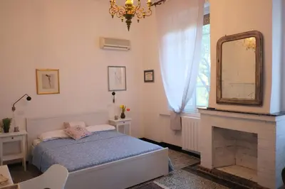 Letto o letti in una camera di Villa Serra B&B iun E6769