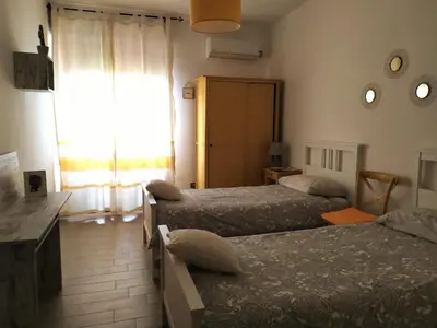 Letto o letti in una camera di B&B Libellula
