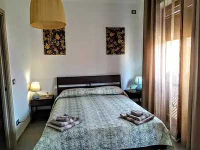 Letto o letti in una camera di B&B Libellula