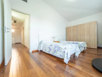 Letto o letti in una camera di B&B Le Bouganville