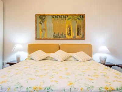 Letto o letti in una camera di B&B Le Bouganville