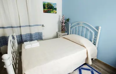 Letto o letti in una camera di LOCANDA VECCHIA FATTORIA