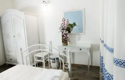 Letto o letti in una camera di LOCANDA VECCHIA FATTORIA