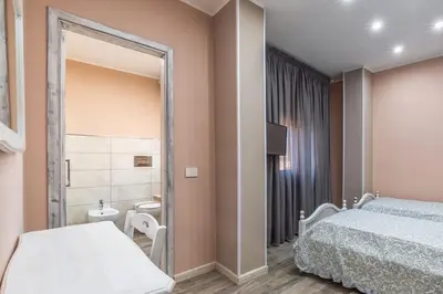 Letto o letti in una camera di B&B da Chiara