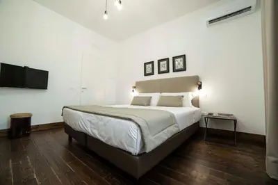 Letto o letti in una camera di Piccolo Feudo