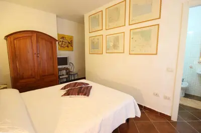 Letto o letti in una camera di Villa Lucrezia