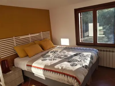 Letto o letti in una camera di B&B Taccu Maccu