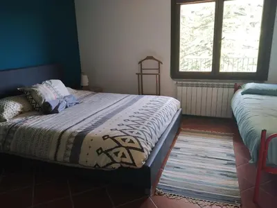 Letto o letti in una camera di B&B Taccu Maccu