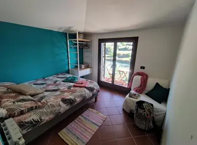 Letto o letti in una camera di B&B Taccu Maccu