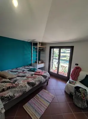 Letto o letti in una camera di B&B Taccu Maccu