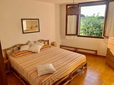 Letto o letti in una camera di Sa Corbula