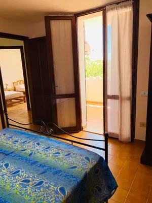 Letto o letti in una camera di Sa Corbula