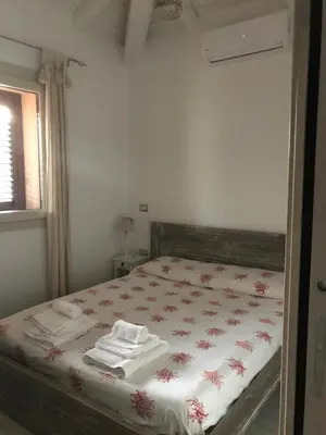 Letto o letti in una camera di Villa della pietra