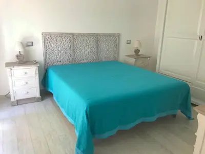 Letto o letti in una camera di Villa della pietra