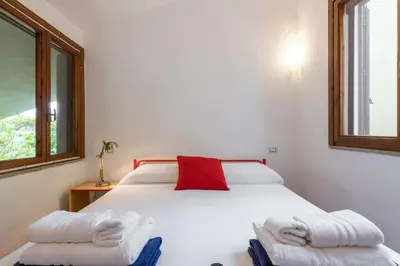 Letto o letti in una camera di Domus Carlotta Apartment with sea view Villasimius