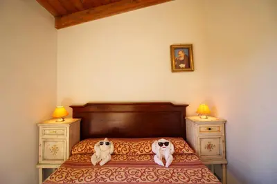 Letto o letti in una camera di Villa Azzurra nel centro di Costa Rei