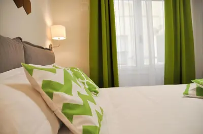 Letto o letti in una camera di EVA LUXURY ROOMS CAGLIARI