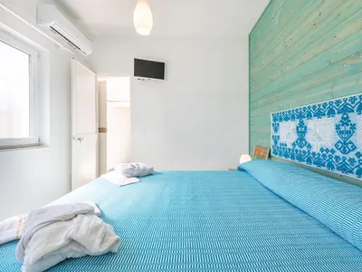 Letto o letti in una camera di Villa Celeste