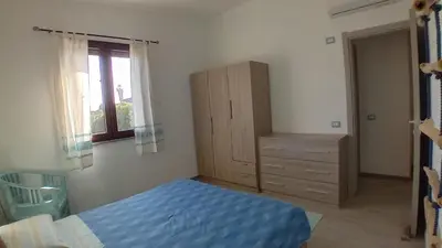 Letto o letti in una camera di Villa Margherita vista mare