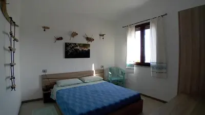 Letto o letti in una camera di Villa Margherita vista mare