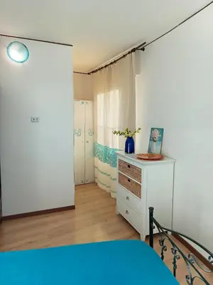 Letto o letti in una camera di Casa al Mare con Giardino Privato