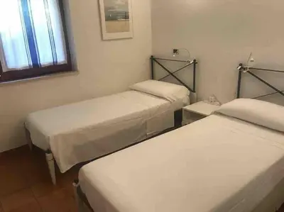 Letto o letti in una camera di Villa Antonio