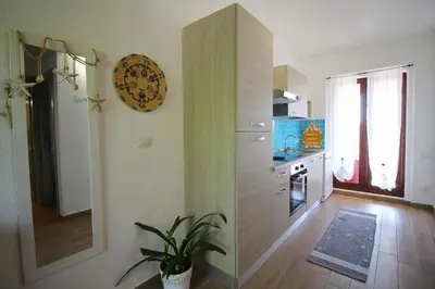 Cucina o angolo cottura di Costa Rei Bilo Turagri vista mare