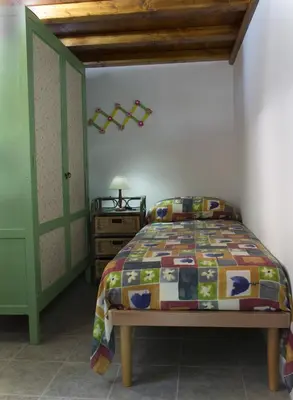 Letto o letti in una camera di Splendida Vista, Sardegna