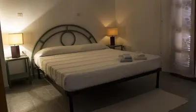 Letto o letti in una camera di Splendida Vista, Sardegna