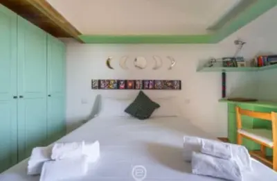 Letto o letti in una camera di Villa Ibisco
