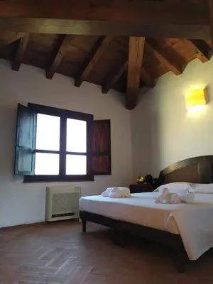 Letto o letti in una camera di Hotel Punta Moros