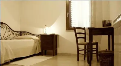 Letto o letti in una camera di Domus Birdi
