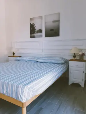 Letto o letti in una camera di Il Cortile