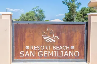 Certificato, attestato, insegna o altro documento esposto da Affittacamere Resort Beach San Gemiliano