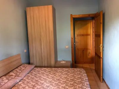 Letto o letti in una camera di Casa Turchese - Villasimius