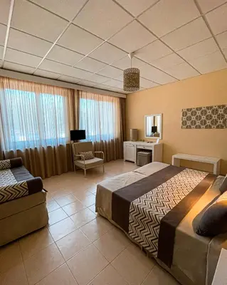 TV o dispositivi per l'intrattenimento presso Hotel Lido Beach PHG