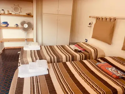 Letto o letti in una camera di Villa sul Mare Calalunga Calasetta Sant Antioco