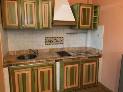Cucina o angolo cottura di Sa Corti Antiga Apartment