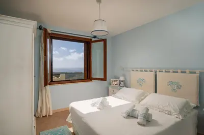 Letto o letti in una camera di Villa Mirto Green House