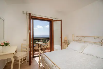Letto o letti in una camera di Villa Mirto Green House