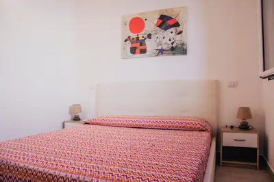Letto o letti in una camera di Milva's Apartment