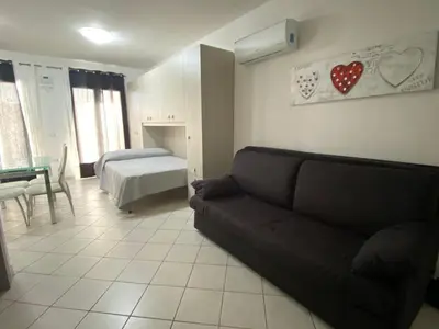 Letto o letti in una camera di Frontemare Portoscuso