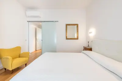 Letto o letti in una camera di A Luxury apartment at Cagliari Poetto Beachfront