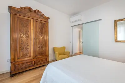 Letto o letti in una camera di A Luxury apartment at Cagliari Poetto Beachfront