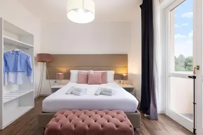 Letto o letti in una camera di Mapi's Rooms - Eja Sardinia