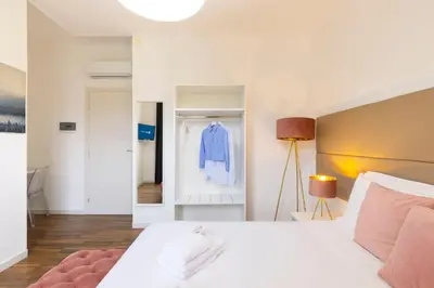 Letto o letti in una camera di Mapi's Rooms - Eja Sardinia