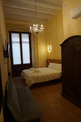Letto o letti in una camera di PALAZZO FULGHER